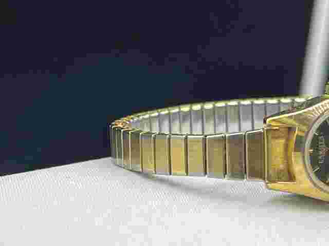 Dakota Black Dial Oval Gold Tone Stretch Band