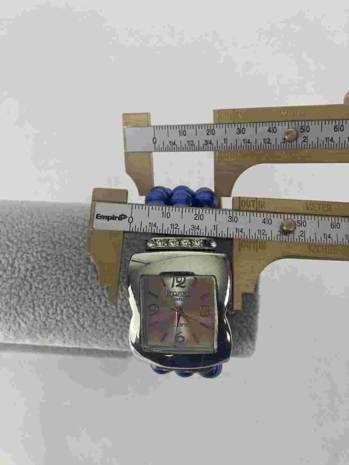 Figaro Couture LPS05539 silver tone quartz watch w/blue beaded bracelet &battery
