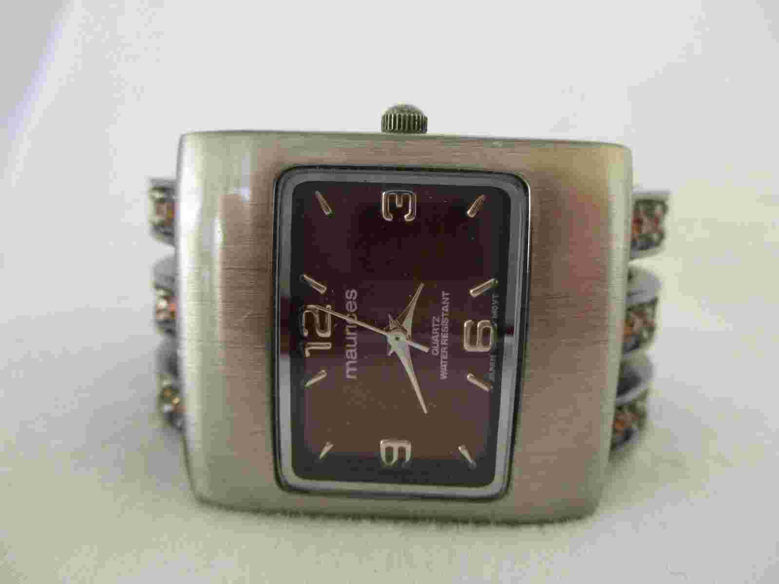 Maurices Analog Wristwatch with a Cuff Band and Quartz Movement