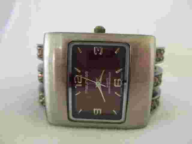 Maurices Analog Wristwatch with a Cuff Band and Quartz Movement