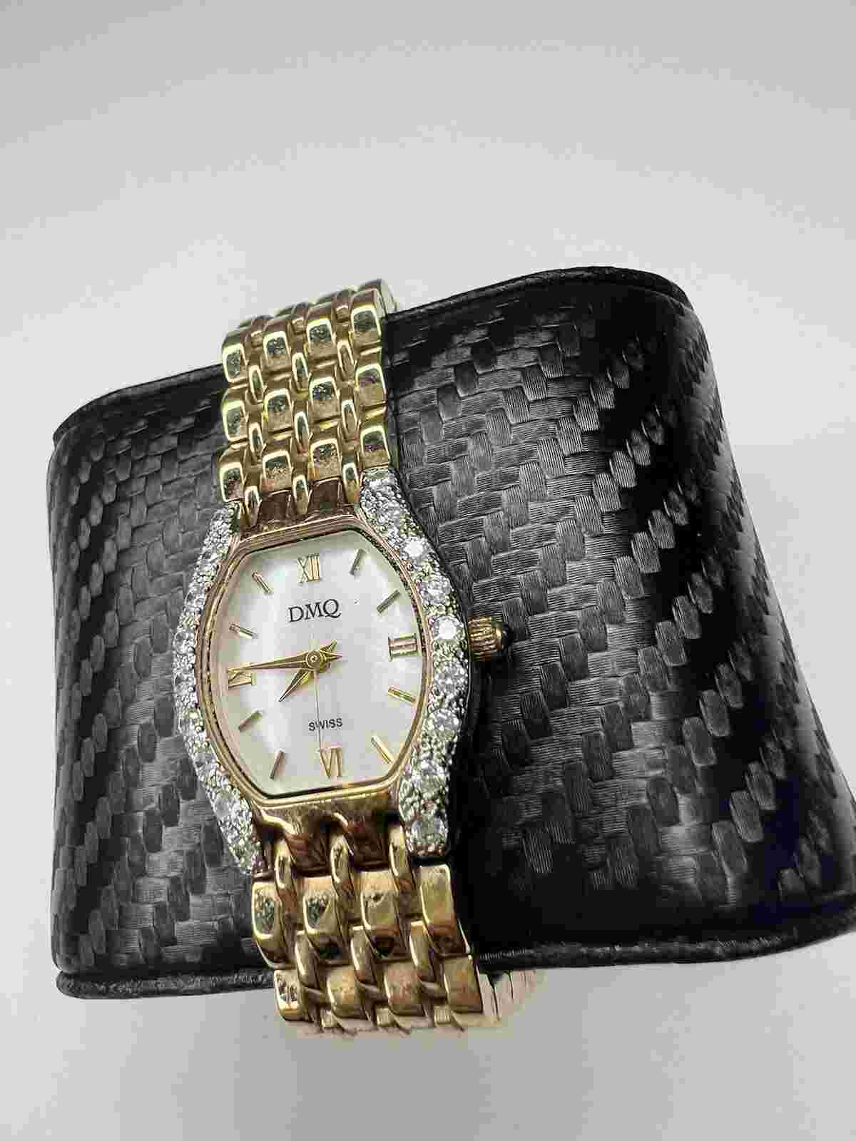 DMQ Swiss Mother of Pearl Crystal Bezel Gold Tone Watch