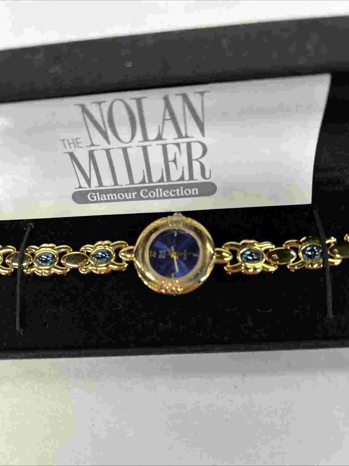 VTG Nolan Miller Gold Tone Ladies Watch With Blue Cabochon Stones Glamour NEW