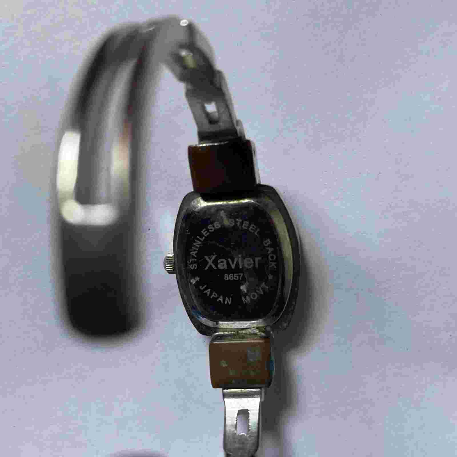 Xavier Eelegant Silver Toned Woman’s Bangle Cuff Band Wristwatch