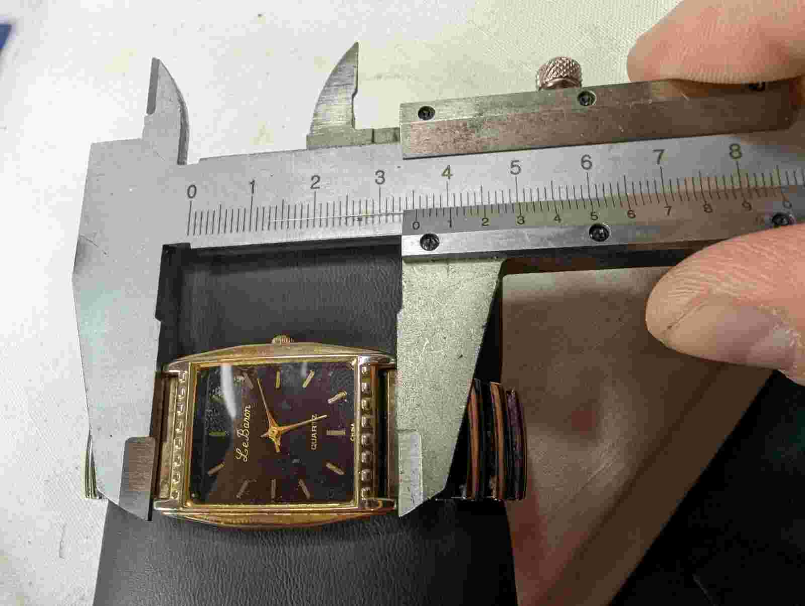Le Baron Gold Tone Expanding Steel Strap Square Face Analog Quartz Watch Ladies