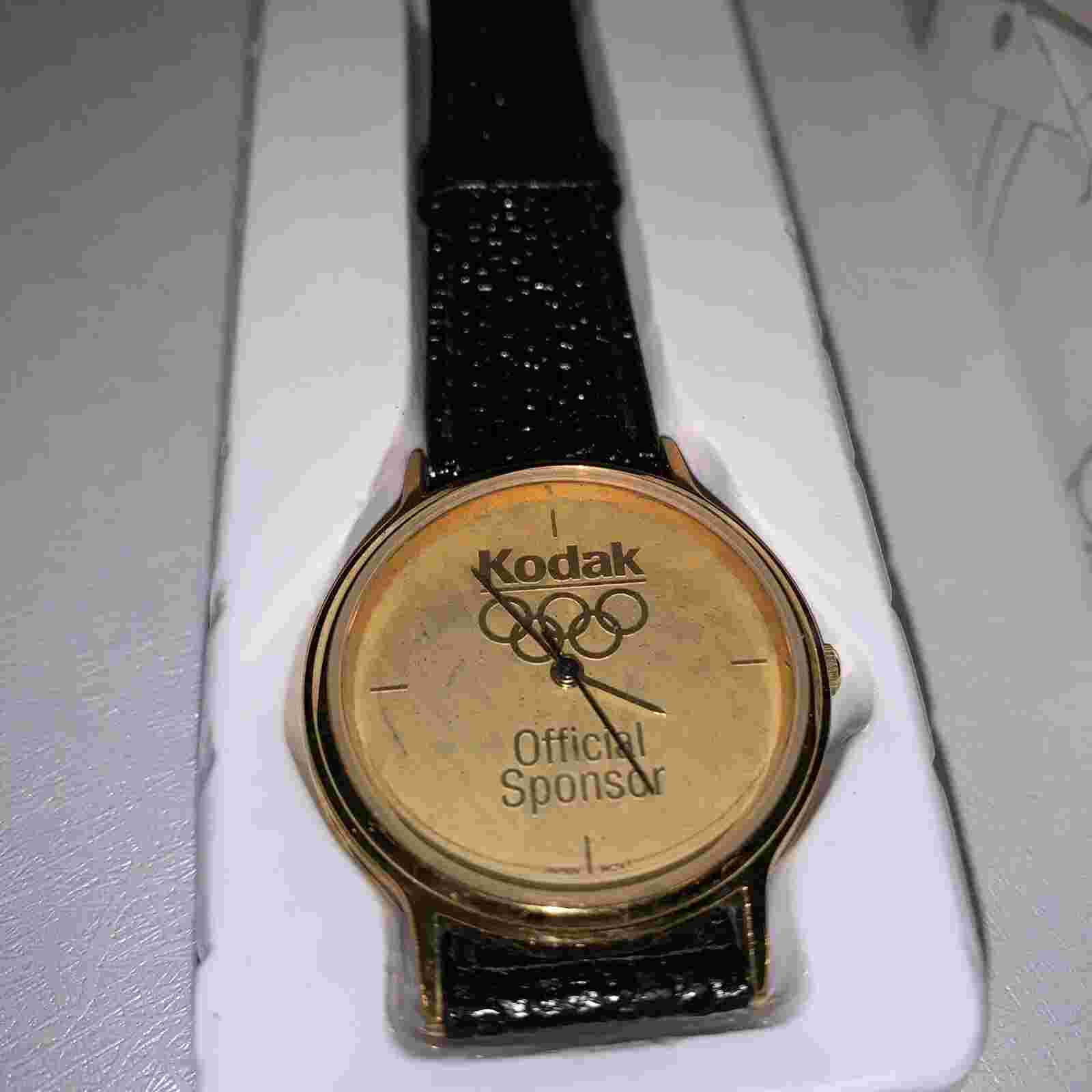 VINTAGE KODAK OLYMPIC OFFICIAL SPONSOR WATCH ORIGINAL BOX BLACK LEATHER NOS