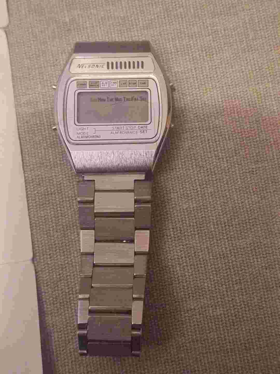 Men's Digital Nelsonic watch face, With Paperwork