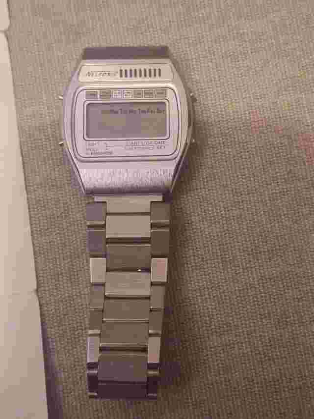 Men's Digital Nelsonic watch face, With Paperwork
