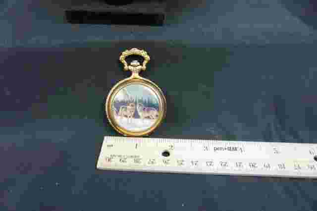 Riviera pocket watch w/wolves on cover- analog