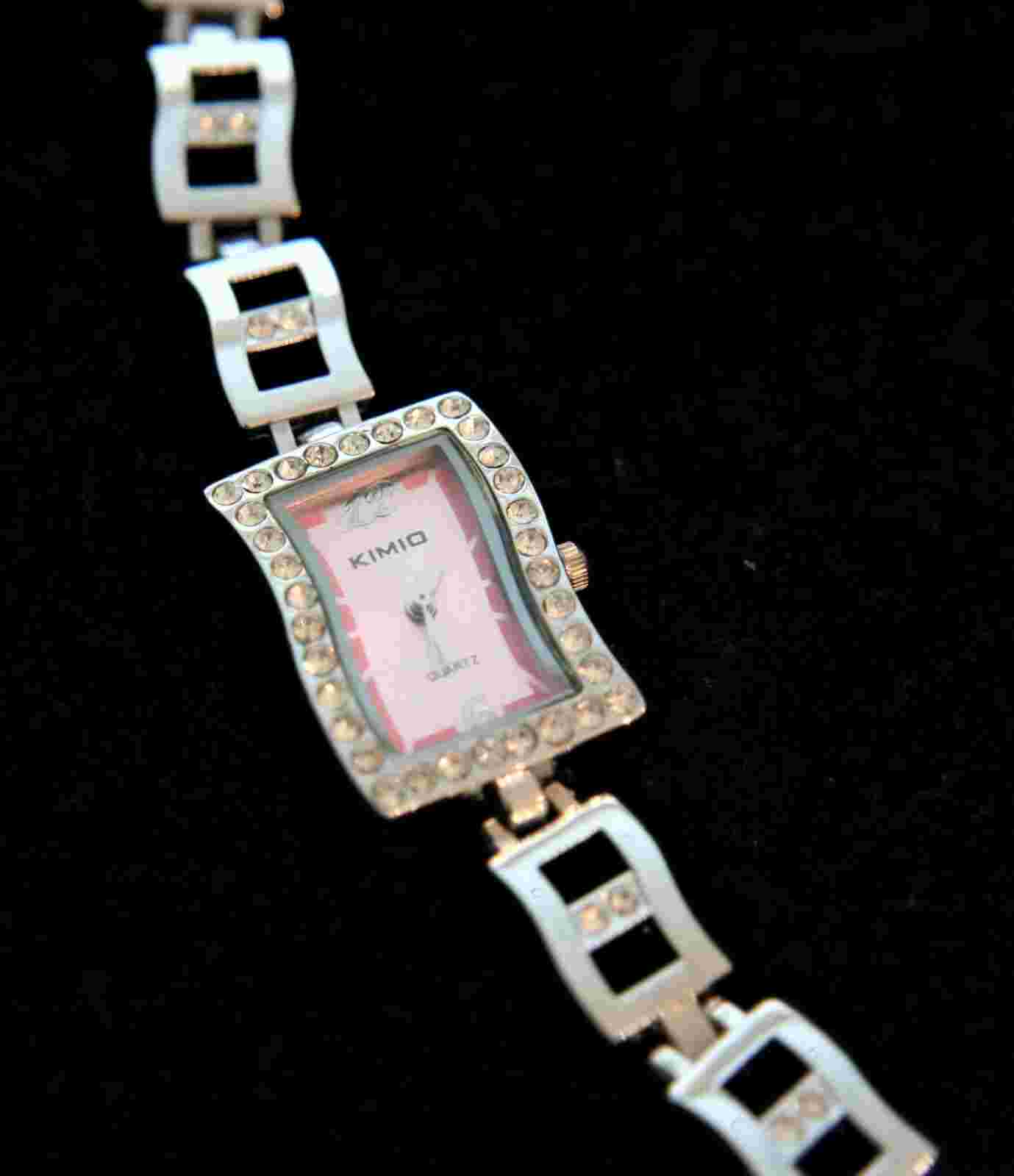 New ladies' pink sunken dial free form rhinestone encrusted quartz wristwatch