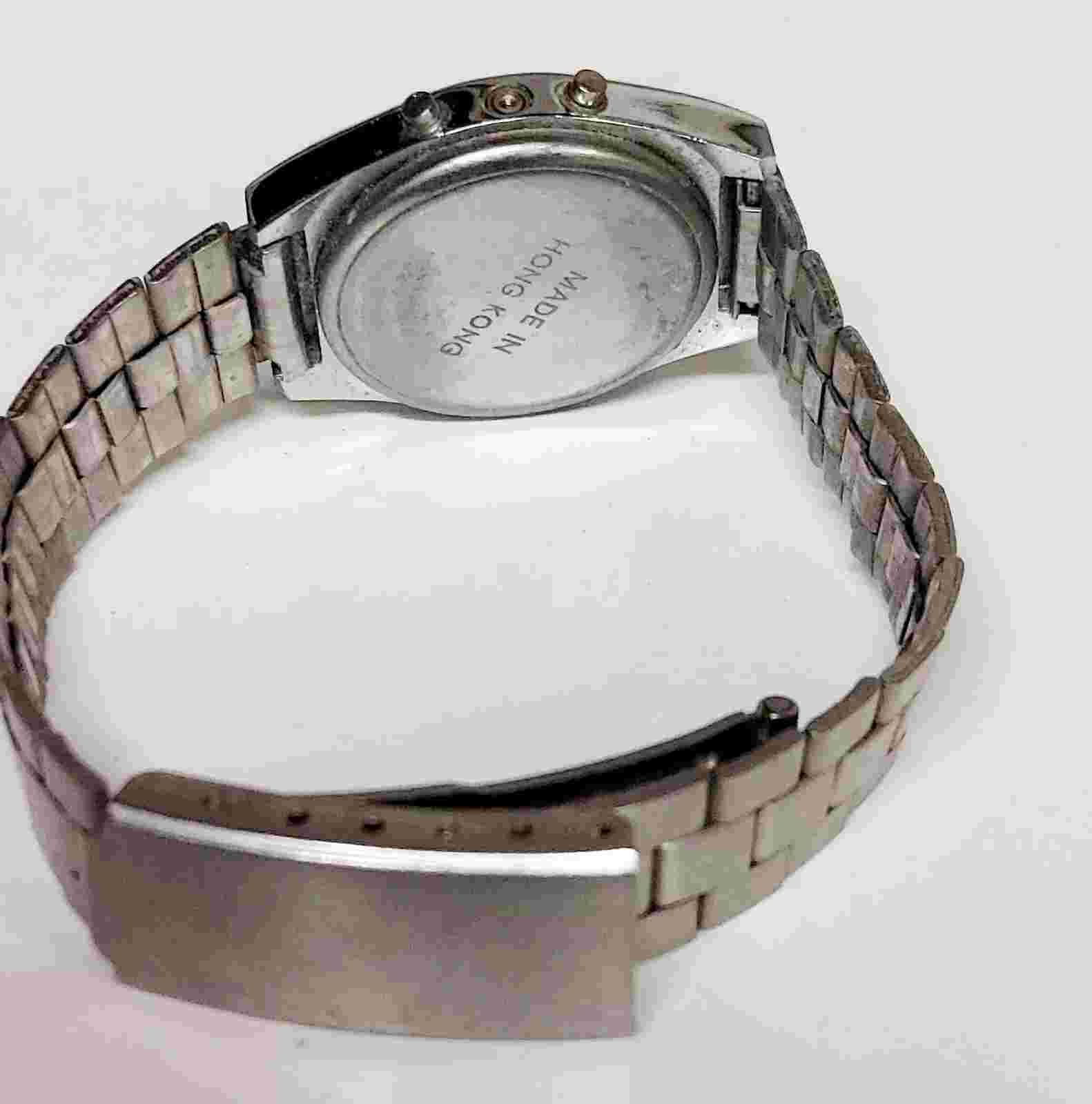 Vintage Delphi TM VIII Digital LCD Wrist Watch Silver Tone Womens Blue Face