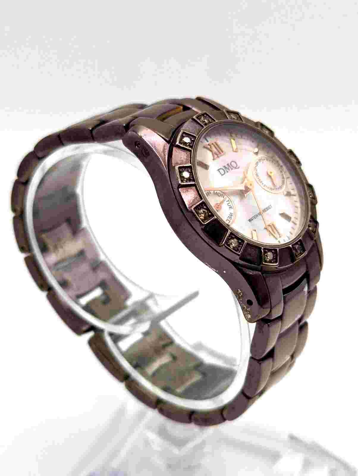 Ladies DMQ CZ Quartz Watch Rhinestones on Bezel Plum Metal Band New Battery