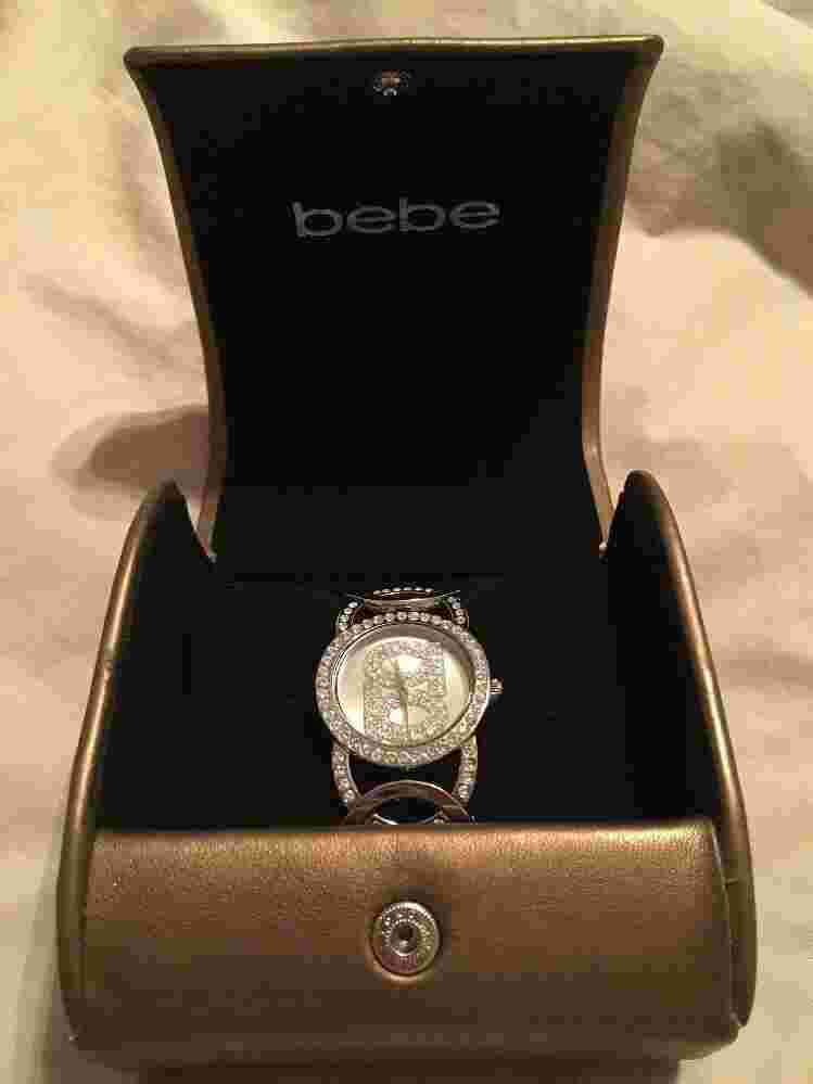 Ladies/Girls "bebe Time" Silver tone Watch with Rhinestones.