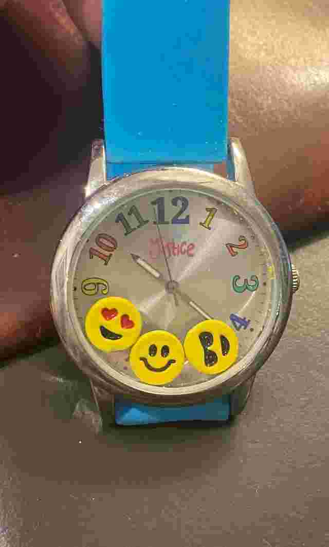 Women's silver Tone Justice Watch with Floating Smiley Faces