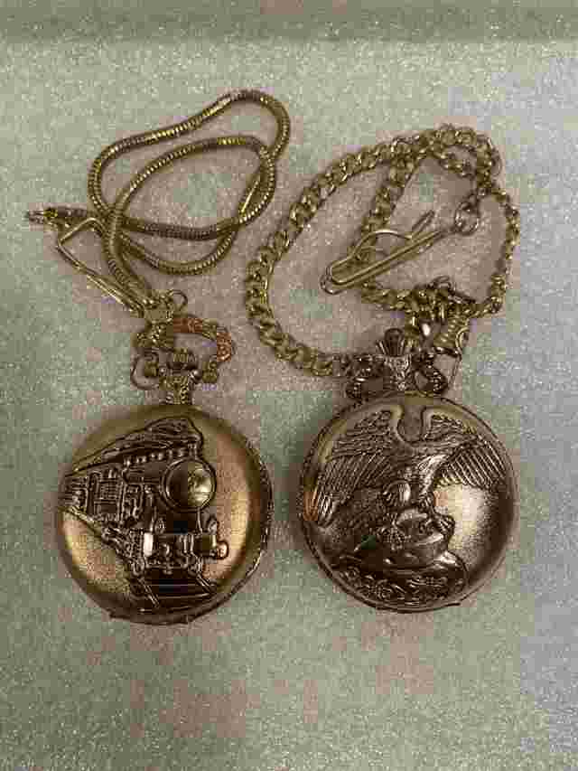 (2) Pocket Watches- Capezio Quartz (Golden Eagle) & Train Gold Tone. Chains.