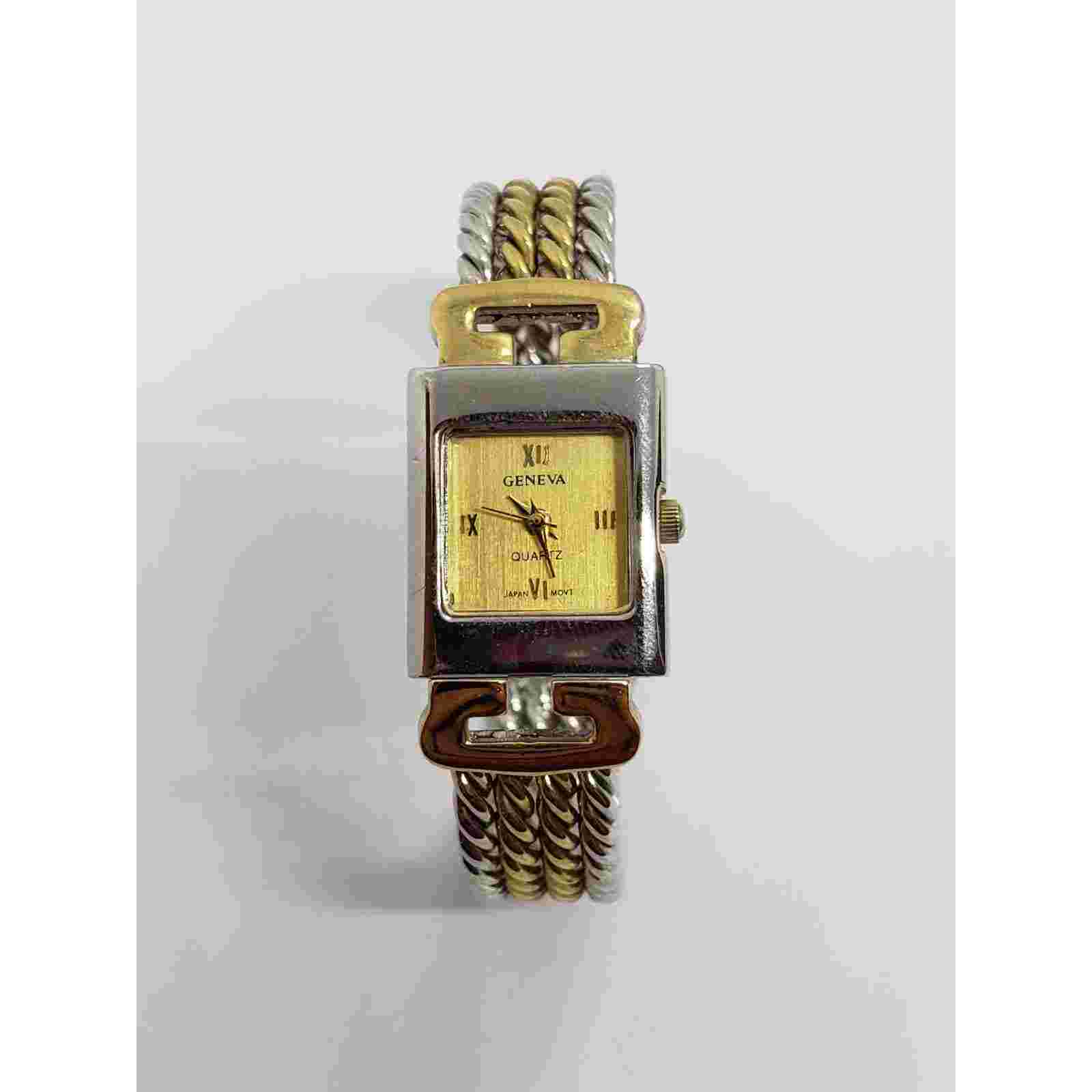 Geneva women's watch. Gold iridescent face. Bangle style band. Working watch