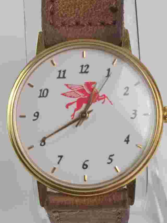 Vintage Swiss Prestige Time Co.Gold Tone Quartz Watch with Red Pegasus Logo