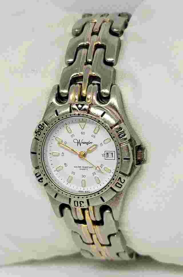 Ladies Wrangler Round Silver Tone White Dial Luminous Date Analog Watch F1
