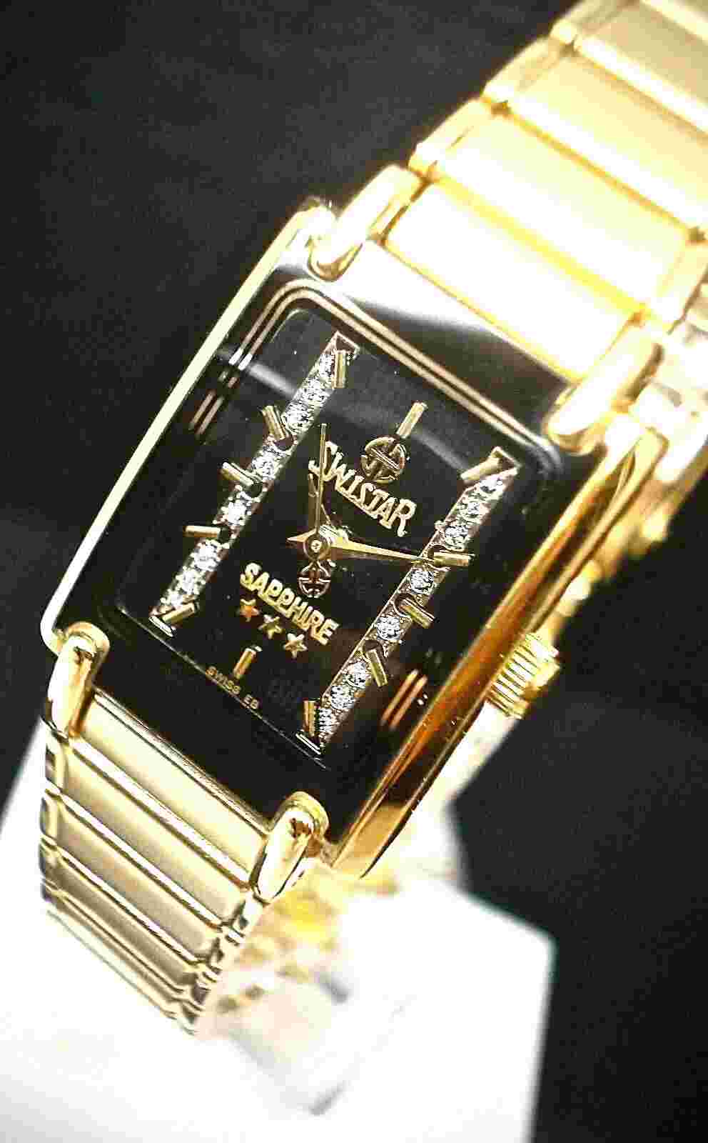 New Swistar 9582L Ladie's Quartz Black Dial and Gold tone Watch  .