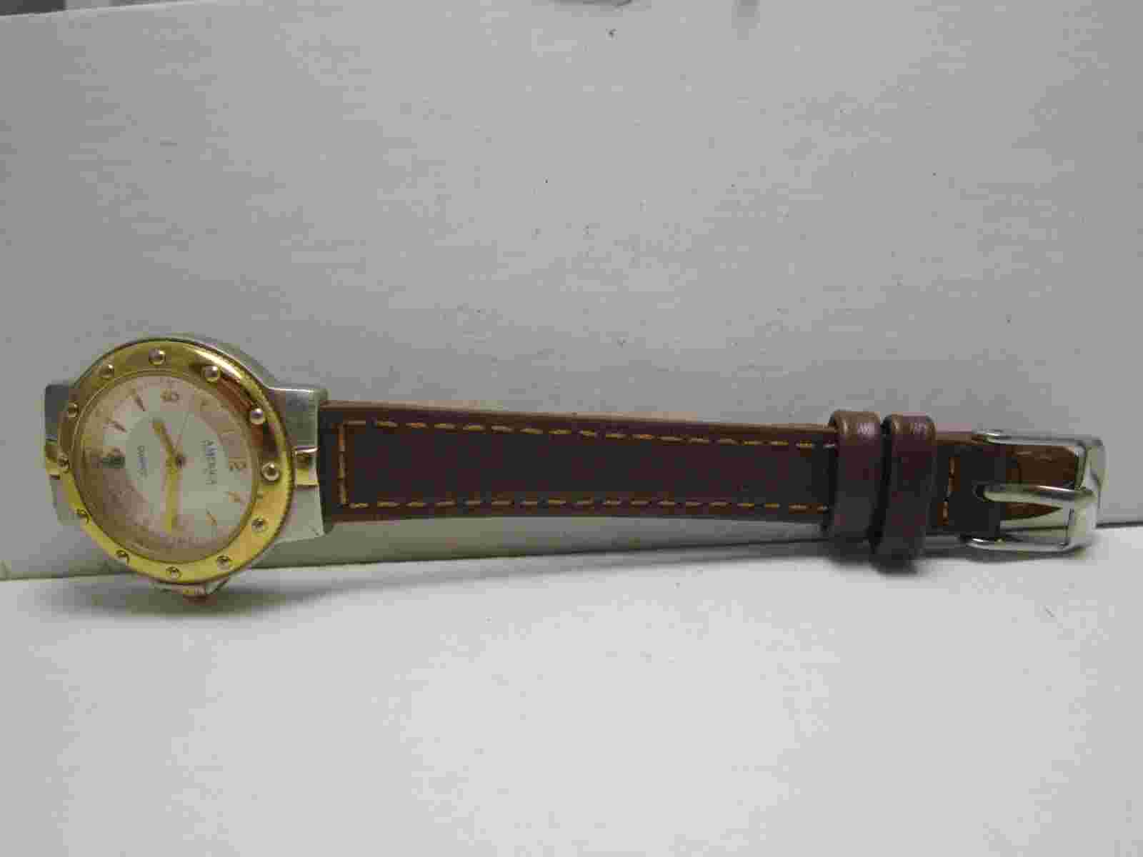 America Perry Ellis Quartz Ladies Watch W/Date Works Fine, New Band.