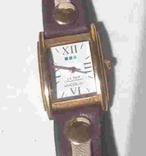 Wanderlust by La Mer Collections White Dial Gold Tone Case Brown Wrap Band Watch