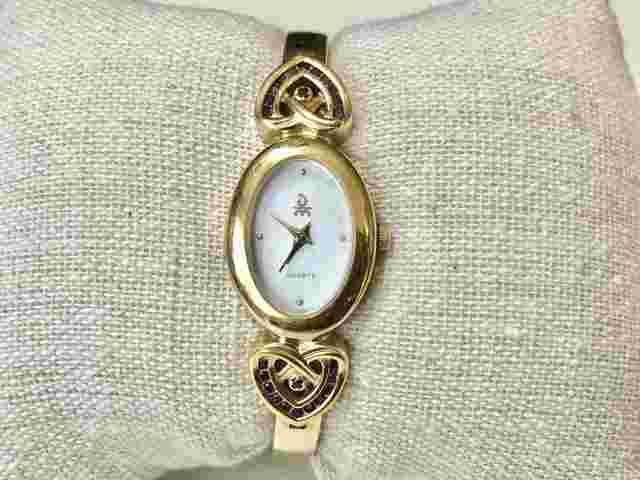 DANBURY MINT LADIES WATCH MOTHER OF PEARL HEART RUBY GOLD TONE 6.25”