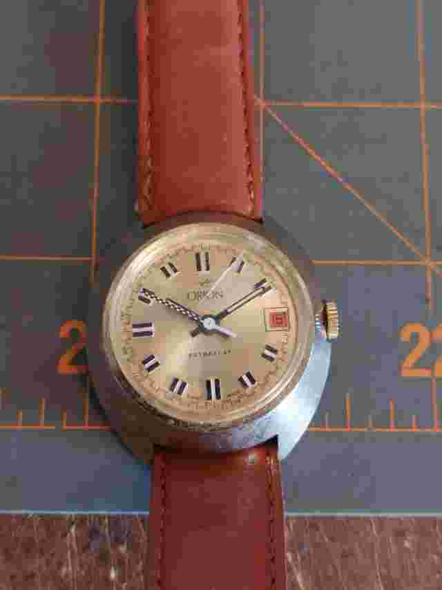 Vintage SWISS MADE WATCH ORION Extra Flat Works Odd Date Manual