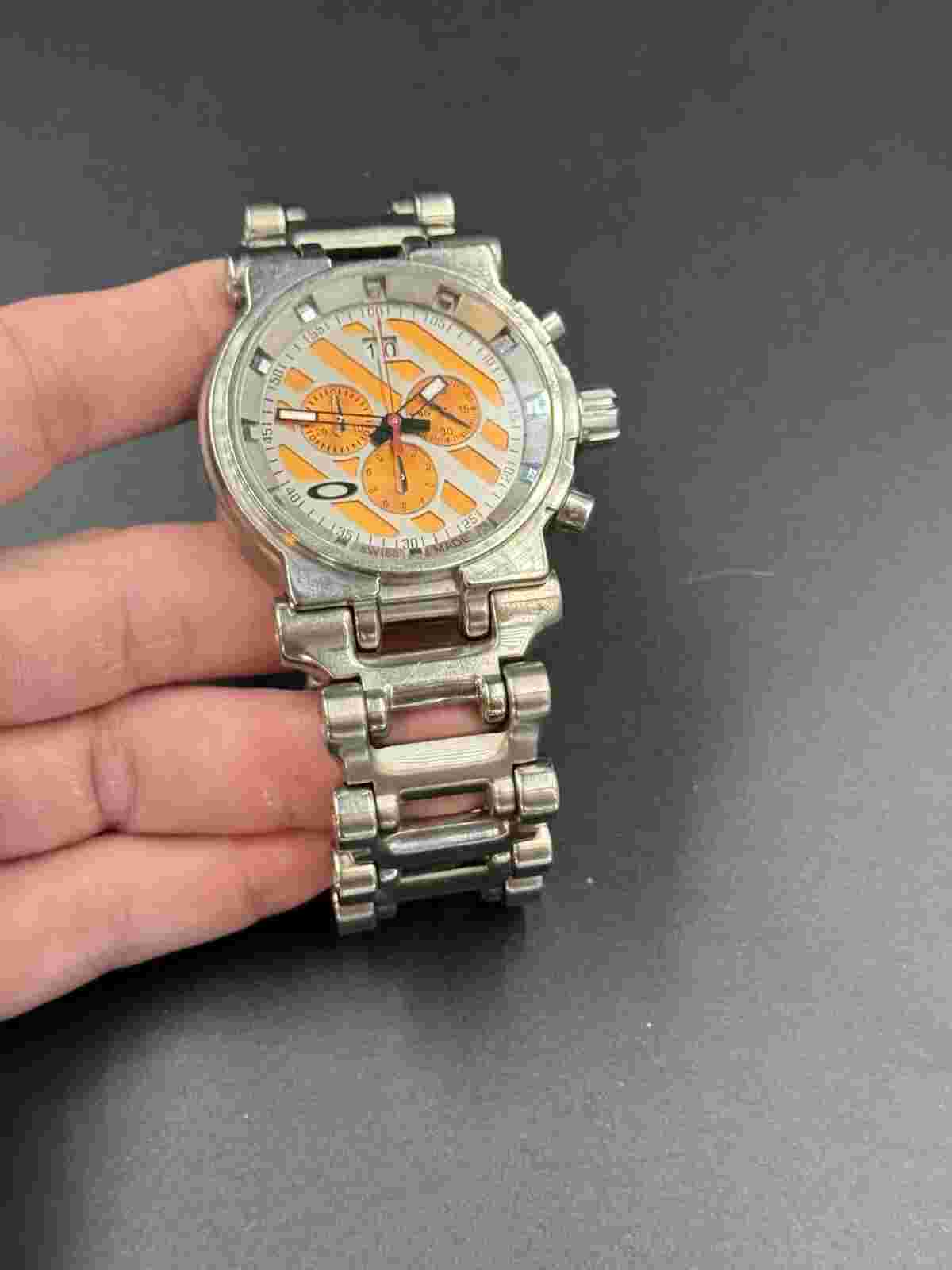Oakley Hollow Point Titanium w/Orange Dial Watch