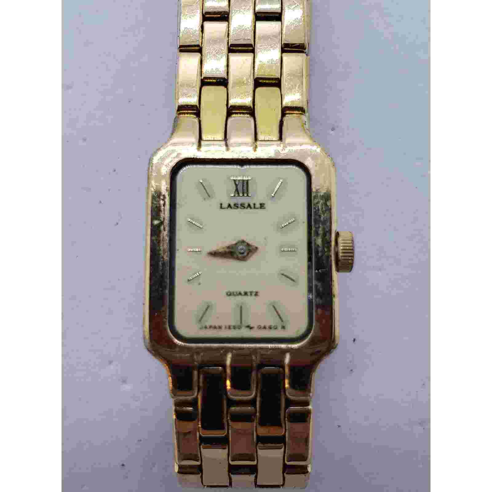 Lassale women's dress watch. 1E50-5A19  620046. Cream colored face. Sold as is
