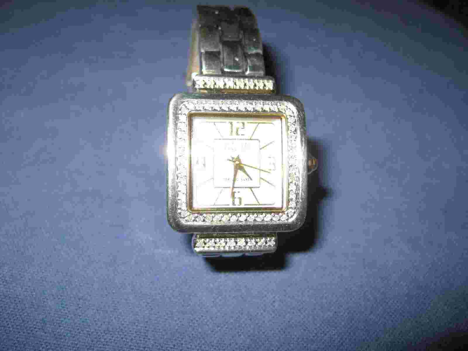 #193  ladys 64 diamond  ECCLISSI sterling silver  and gold plate  watch