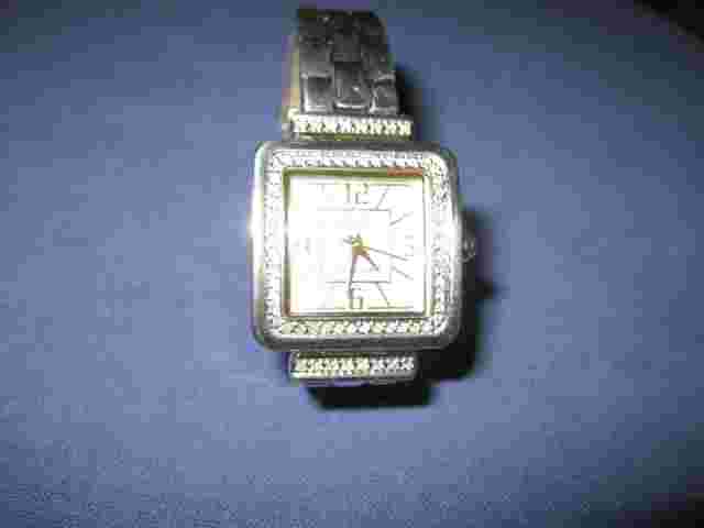 #193  ladys 64 diamond  ECCLISSI sterling silver  and gold plate  watch