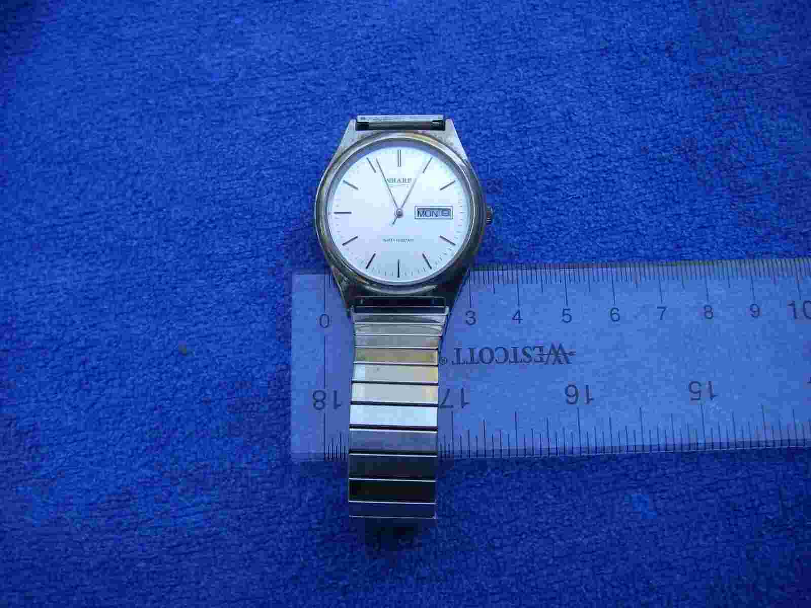 Vintage Sharp 1980s Men's 257193 Quartz Dress Watch-Silver Tone Date AS IS