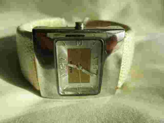 Magna Analog Wristwatch with a Cuff Band and Quartz Movement