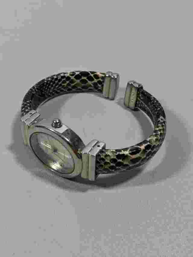 Studio Silver Tone Oval Case 24.8 mm Open Cuff Reptile Pattern Style Band Watch