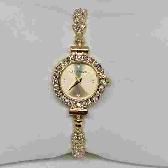 Alexis bendel gold tone ladies wrist watch quartz analog 23mm running