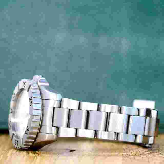 BEUCHAT ABYSS DIVERS WOMENS WATCH WHITE ARABIC DIAL ROTATING BEZEL 200M