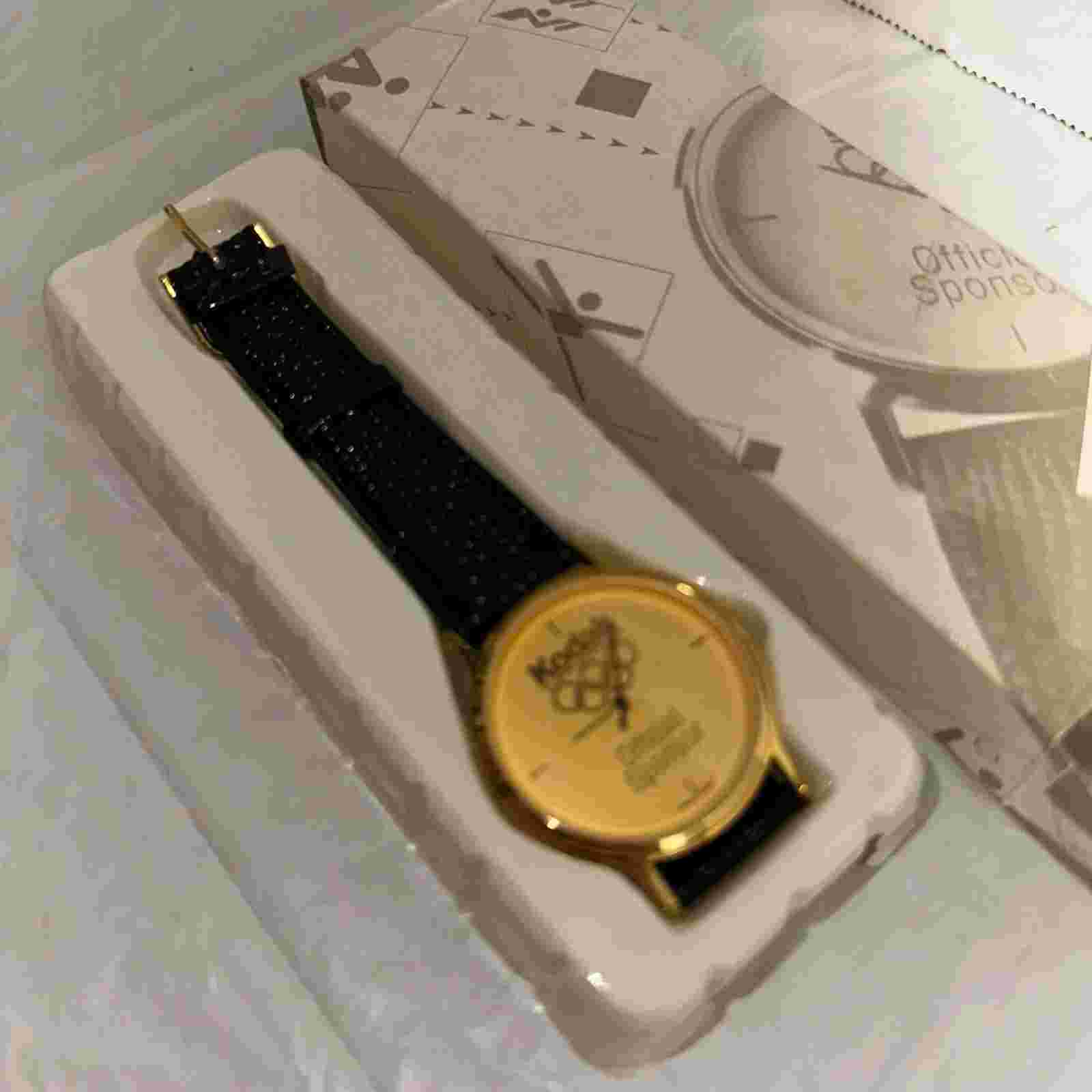 Kodak Olympic Sponsor Gold-Tone Watch With Black Leather Strap