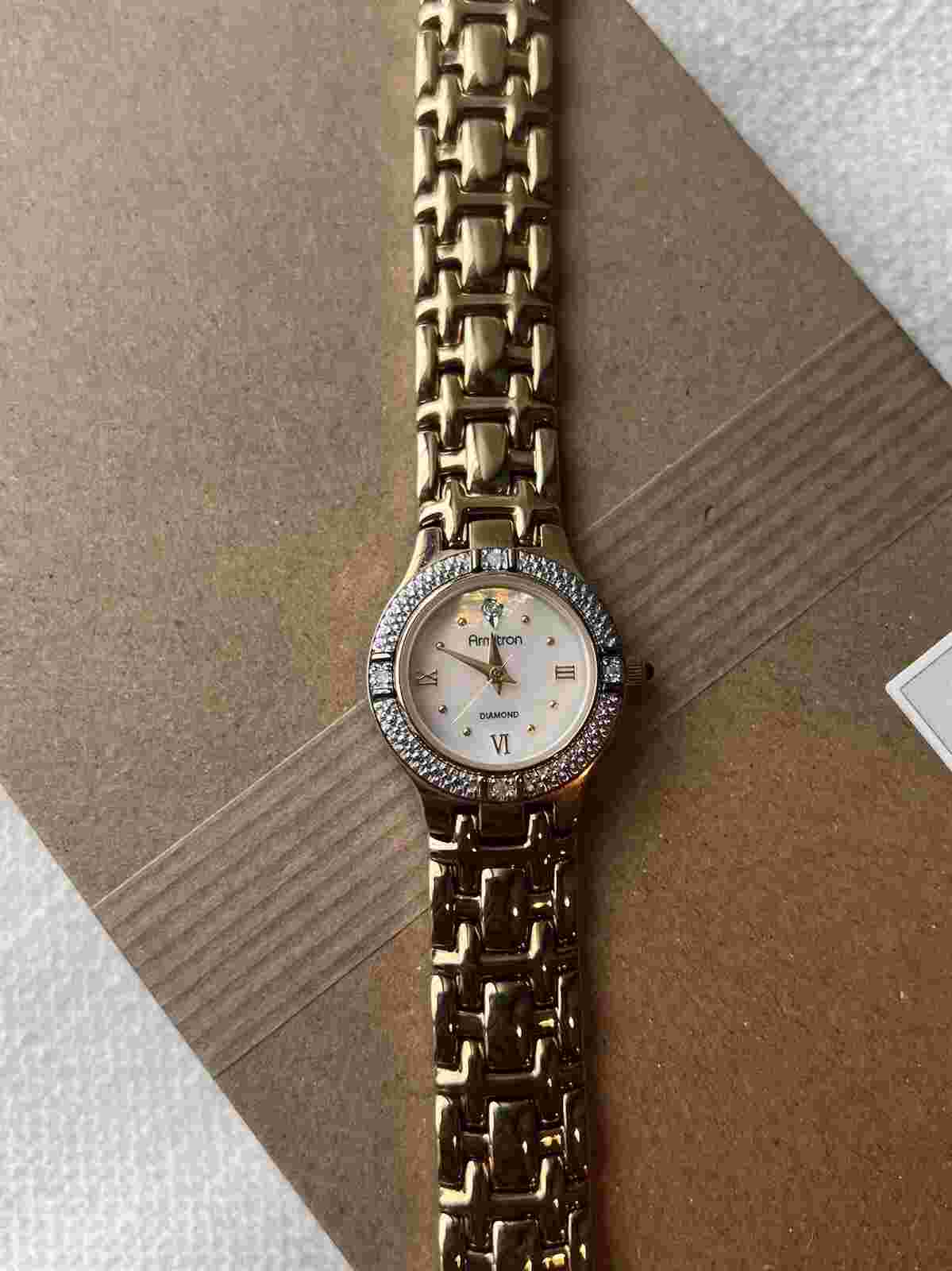 SET OF 2 VTG WATCHES (chaika porcelain strap watch and armitron gold tone watch)