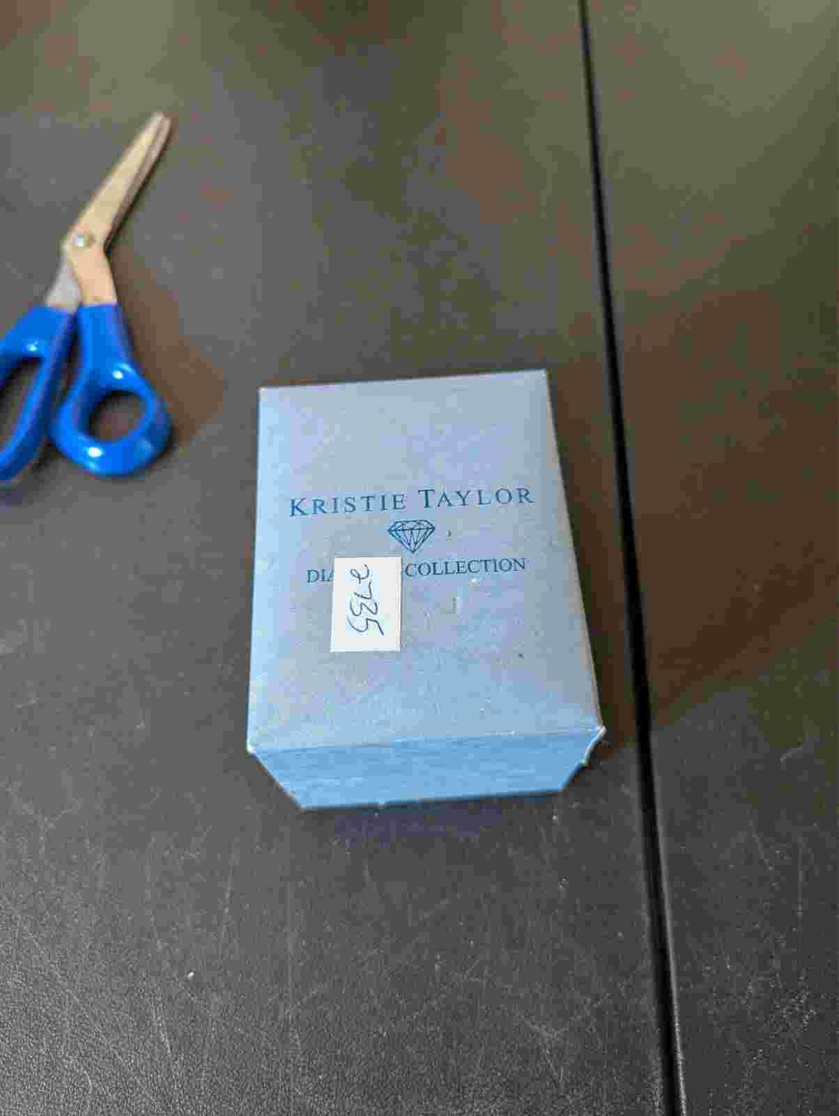 Kristie Taylor eight diamond gold tone watch