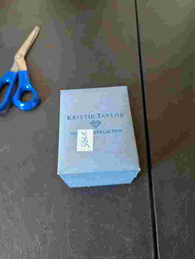 Kristie Taylor eight diamond gold tone watch