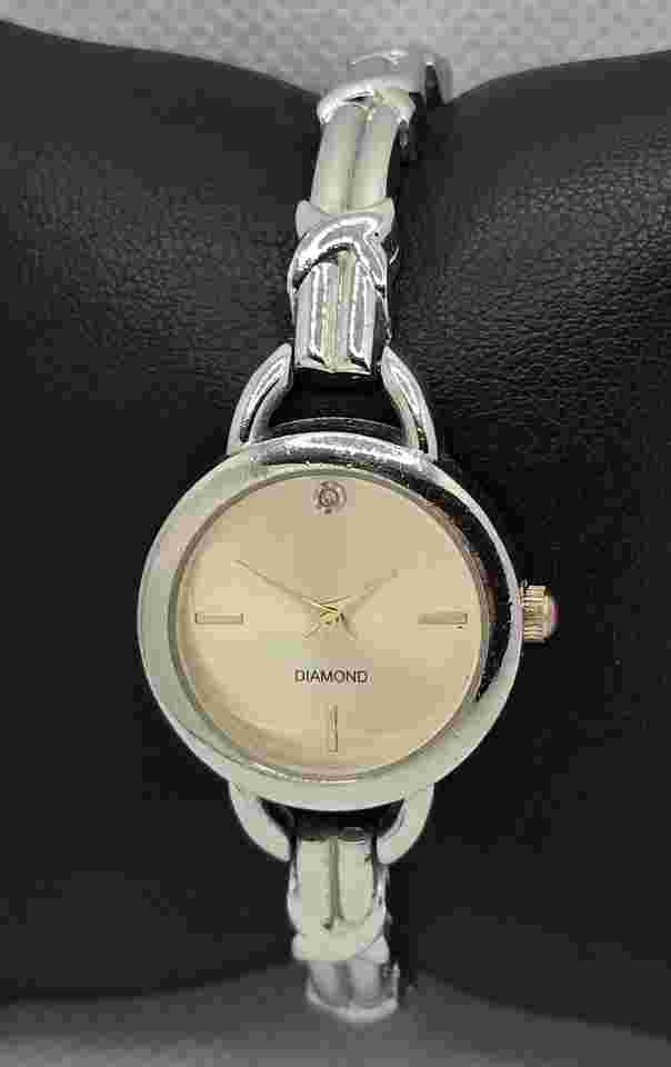 Women's Classic Dress Diamond Round Champagne Dial Silver Tone Bangle Watch 04