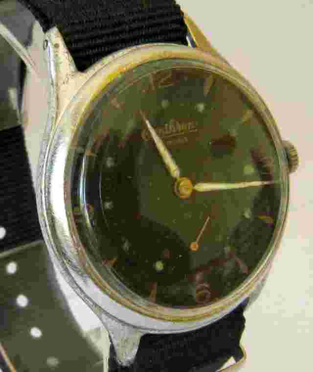 VINTAGE SWISS MEN'S "OMICROM" RARE MECHANICAL OVERSIZE WATCH,BLACK DIAL # 65A
