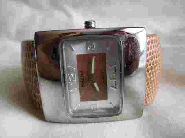 Magna Analog Wristwatch with a Cuff Band and Quartz Movement