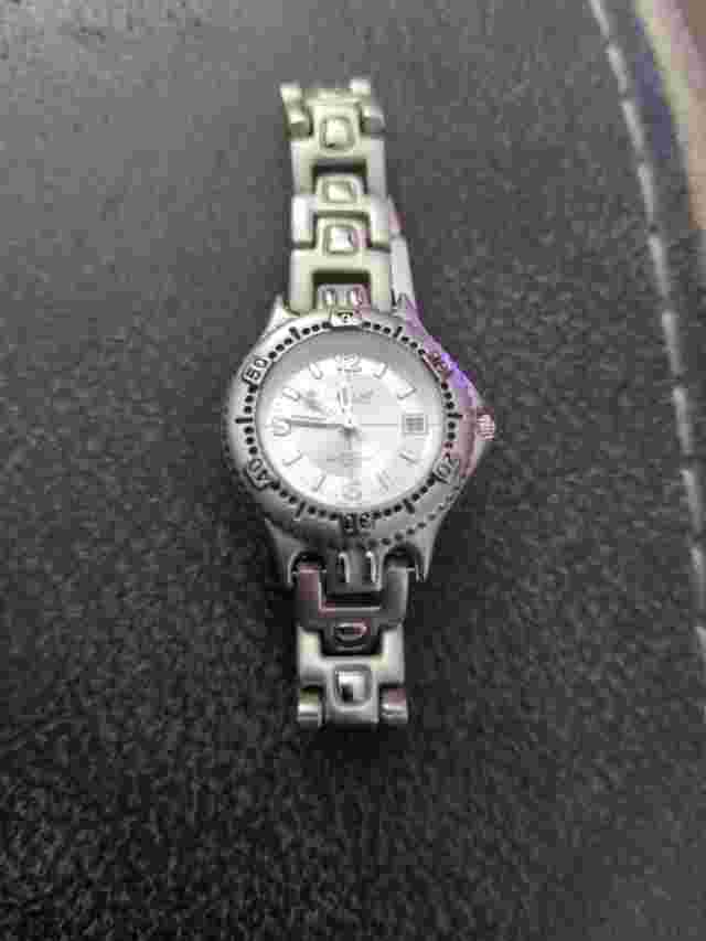 B.U.M. Equipment Women Watch Date Quartz Analog 26mm Silver Tone Band New Batter