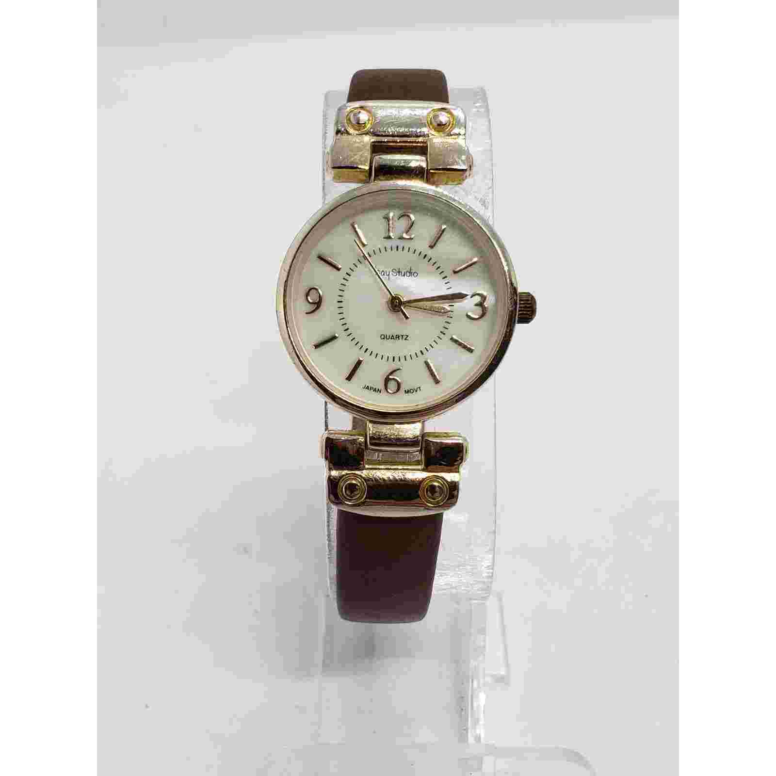 Bay Studio women's watch. White Iridescent face with gold accents. Working watch