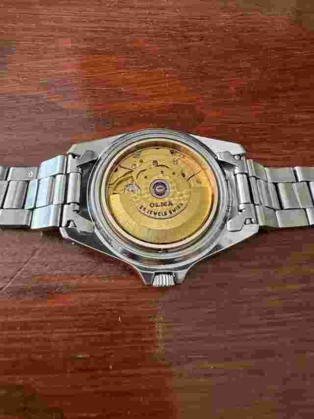vintage OLMA auto diver 200 M date quick set bezel rota.left site scew down crow