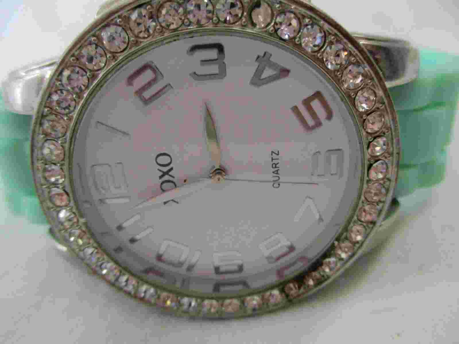 XOXO Watch Blue Buckle Band Silver Toned Rhinestones Round White Face