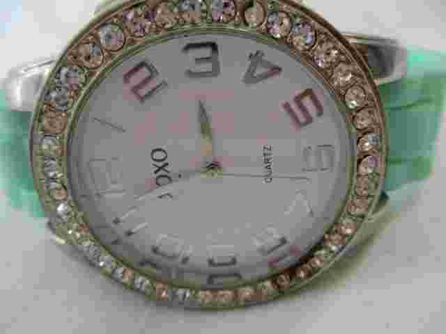 XOXO Watch Blue Buckle Band Silver Toned Rhinestones Round White Face