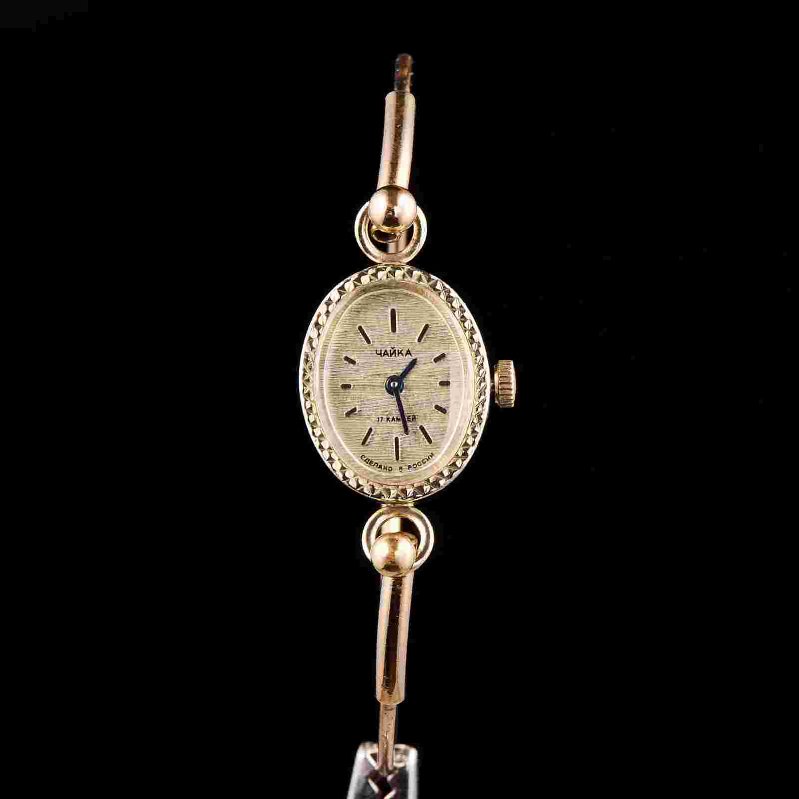 Small women's cocktail watch with gilding. Vintage women's mechanical wristwatch