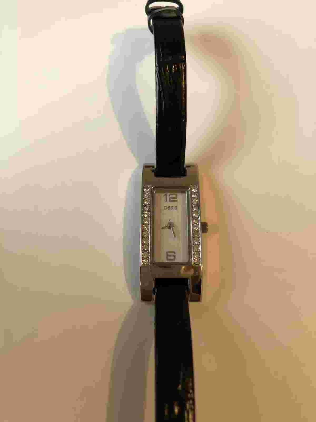 Oasis ladies watch. Leather strap. needs new battery.
