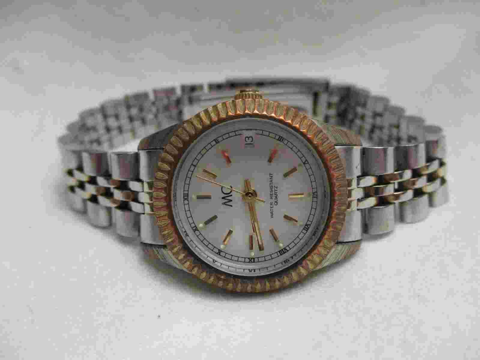MC Analog Wristwatch with Quartz Movement and Water Resistance